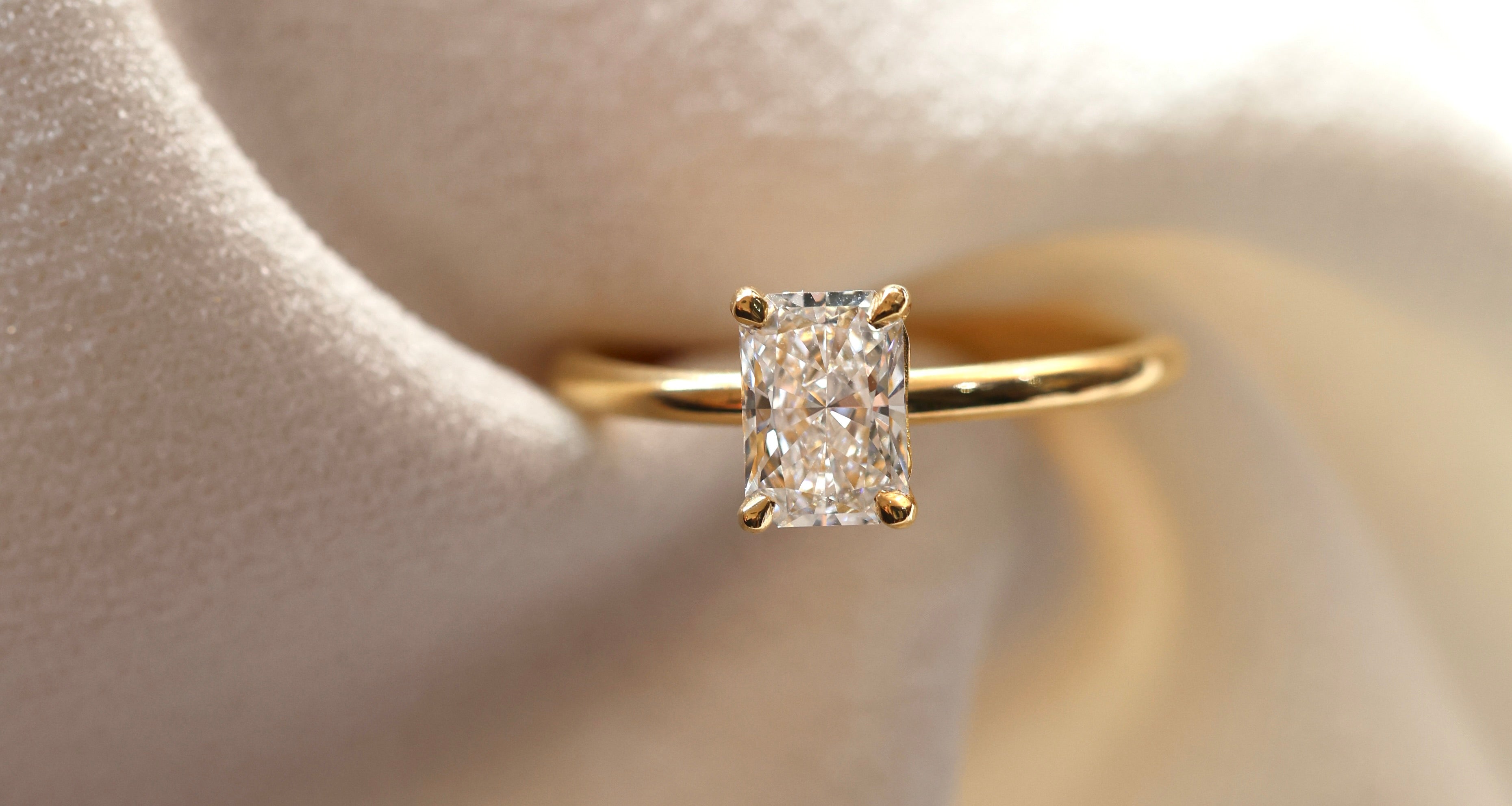 radiant cut diamond engagement ring in yellow gold