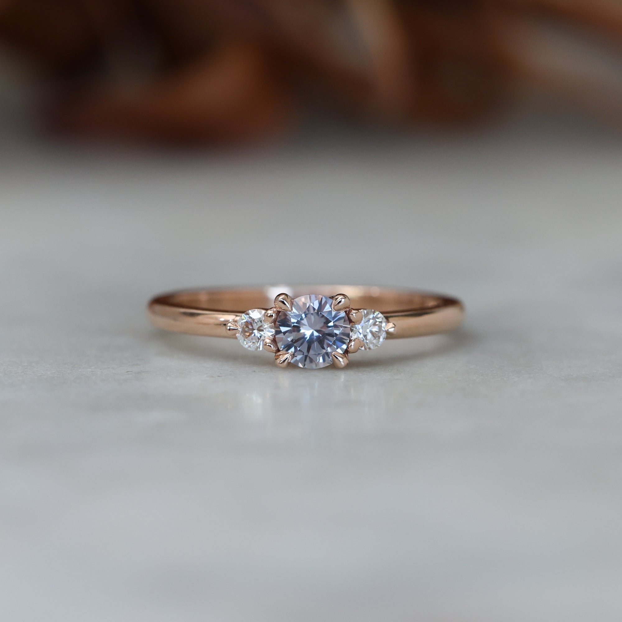 0.40ct Montana sapphire lunar trilogy engagement ring