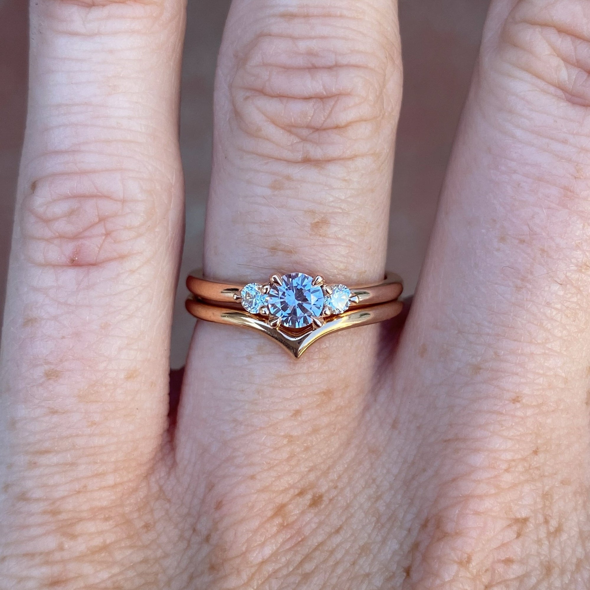 0.40ct Montana sapphire lunar trilogy engagement ring with wedding band