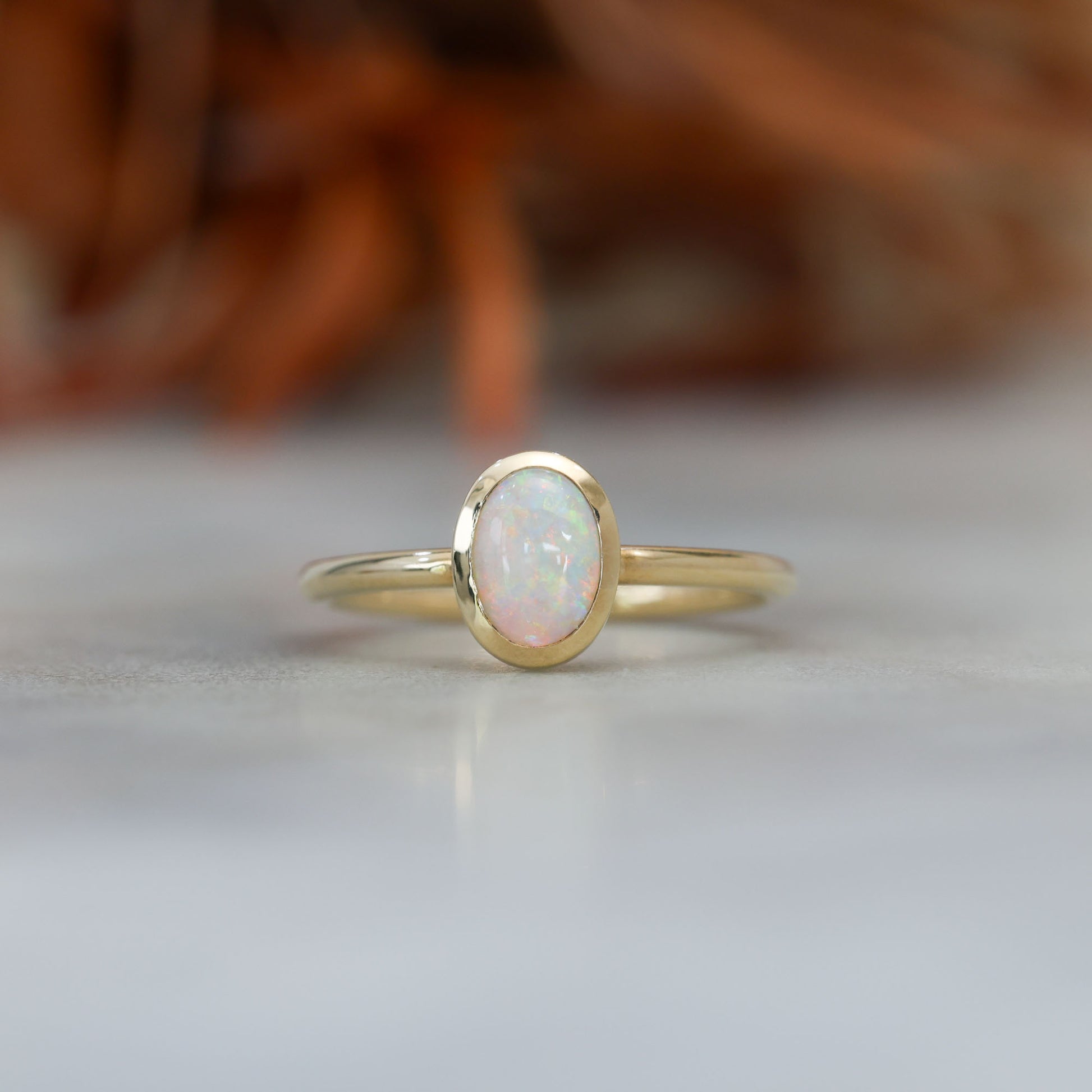 0.43ct opal bezel ring 