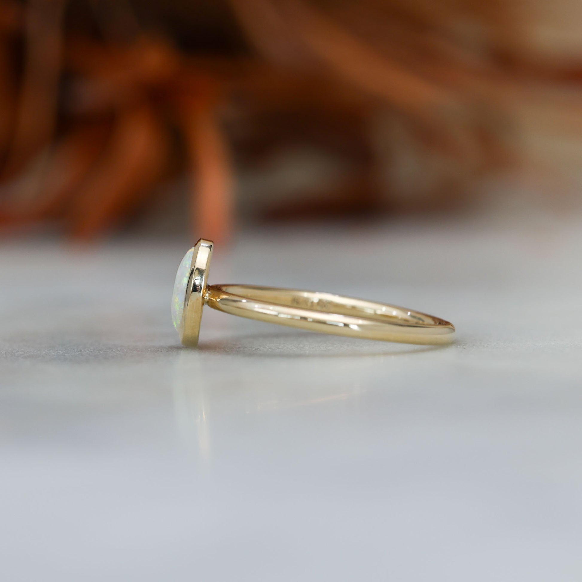 0.43ct opal bezel ring 