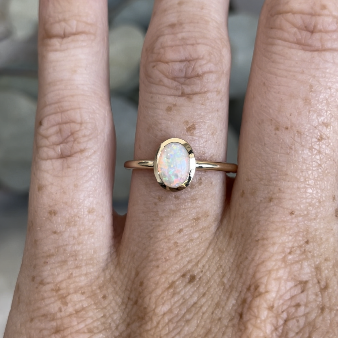 0.43ct oval cut australian opal ring