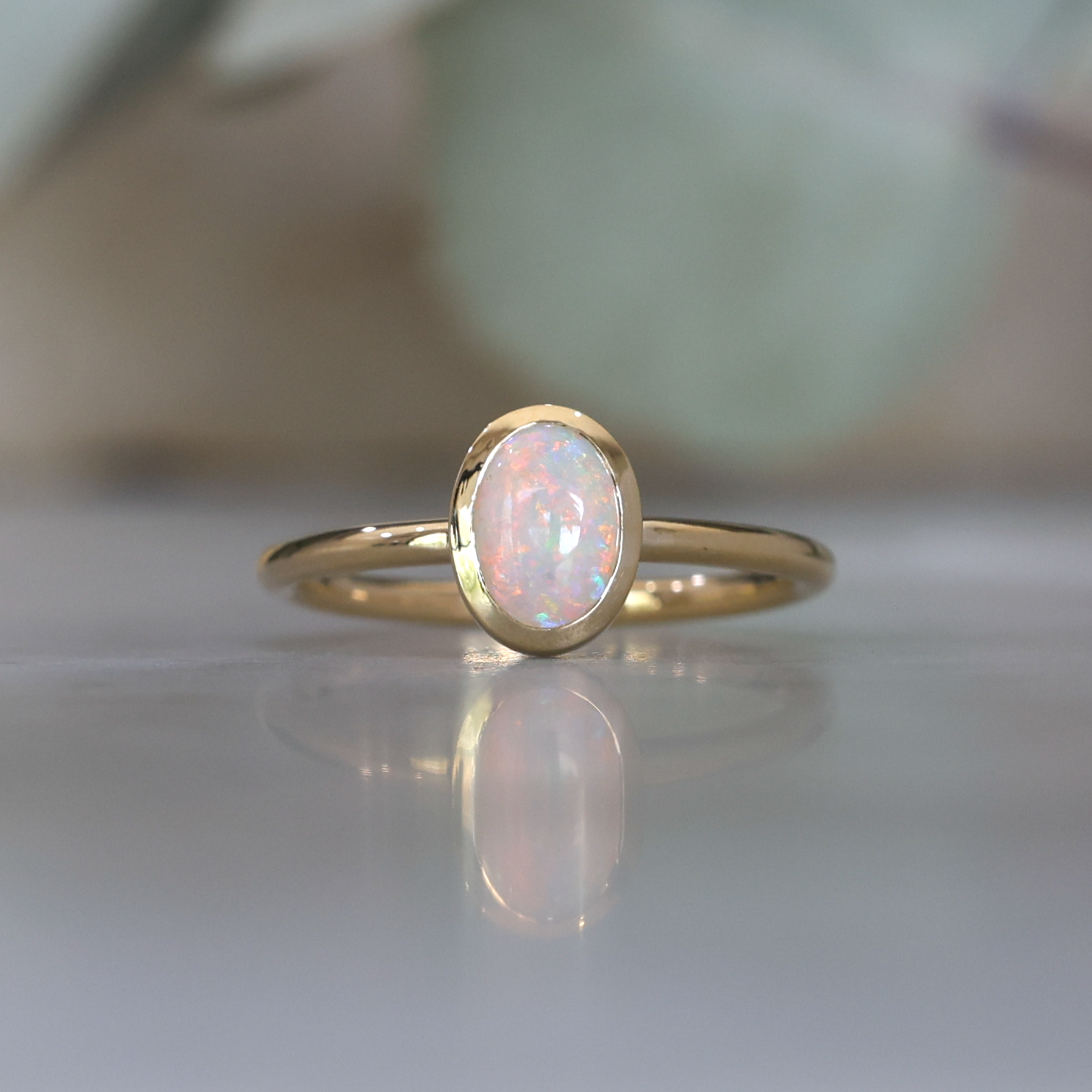 0.43ct oval cut australian opal ring