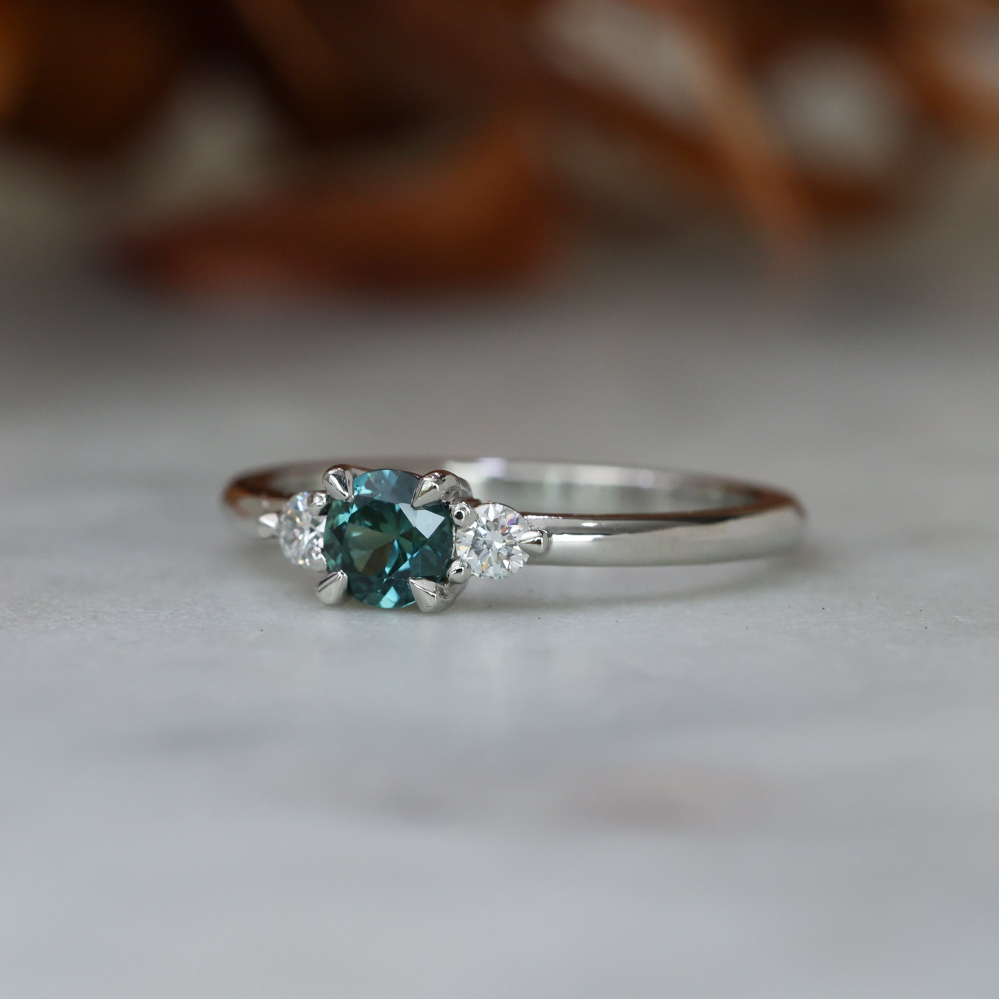 0.46ct round cut australian parti sapphire trilogy engagement ring