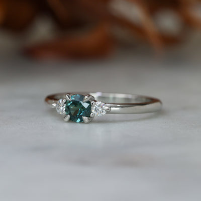 0.46ct round cut australian parti sapphire trilogy engagement ring