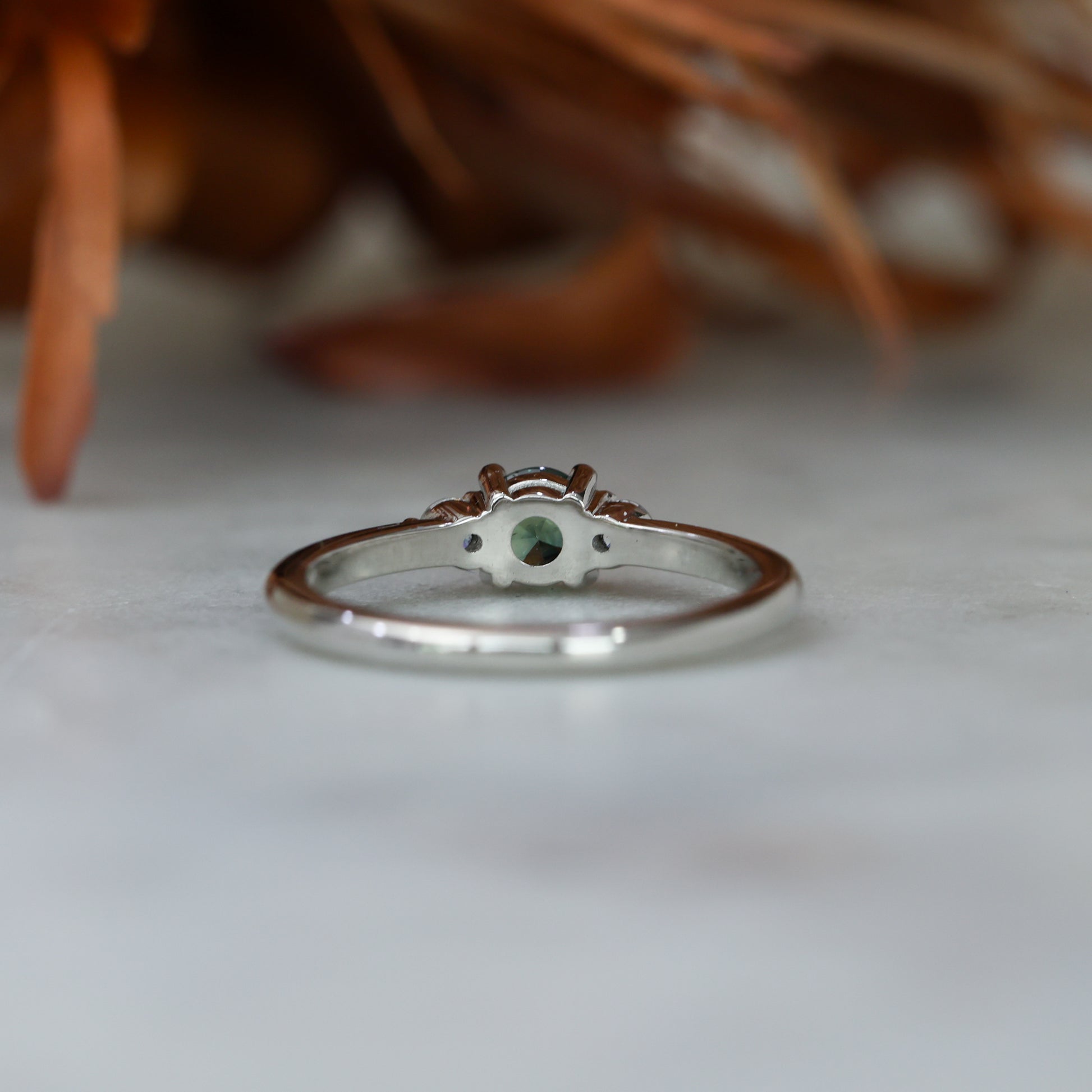 0.46ct round cut australian parti sapphire trilogy engagement ring