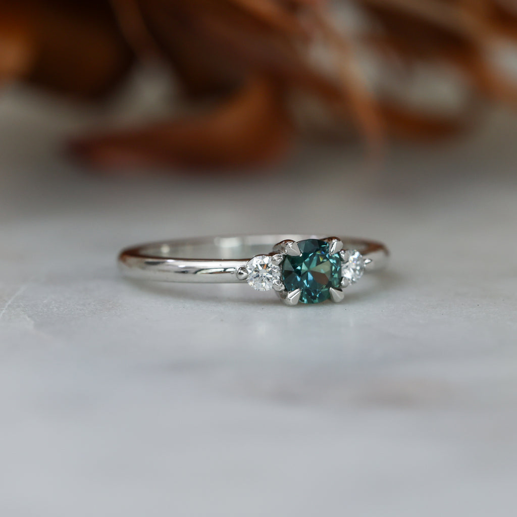 0.46ct round cut australian parti sapphire trilogy engagement ring