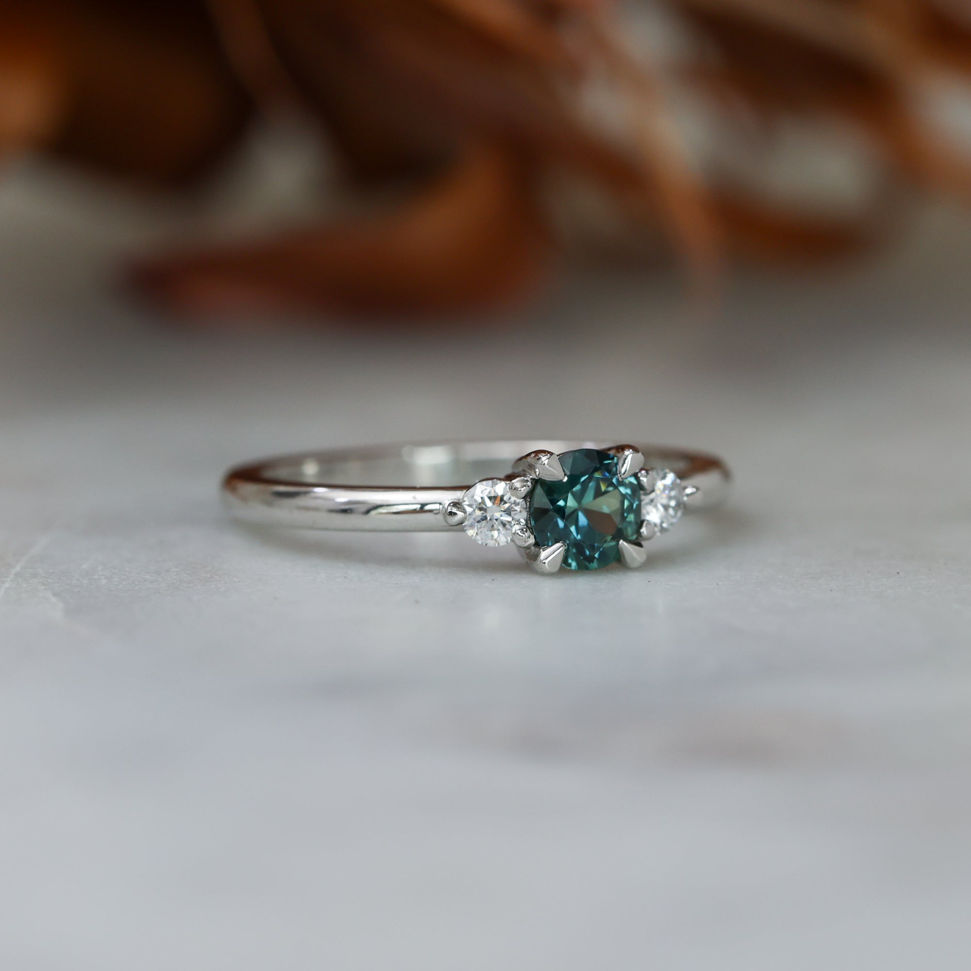 0.46ct round cut australian parti sapphire trilogy engagement ring