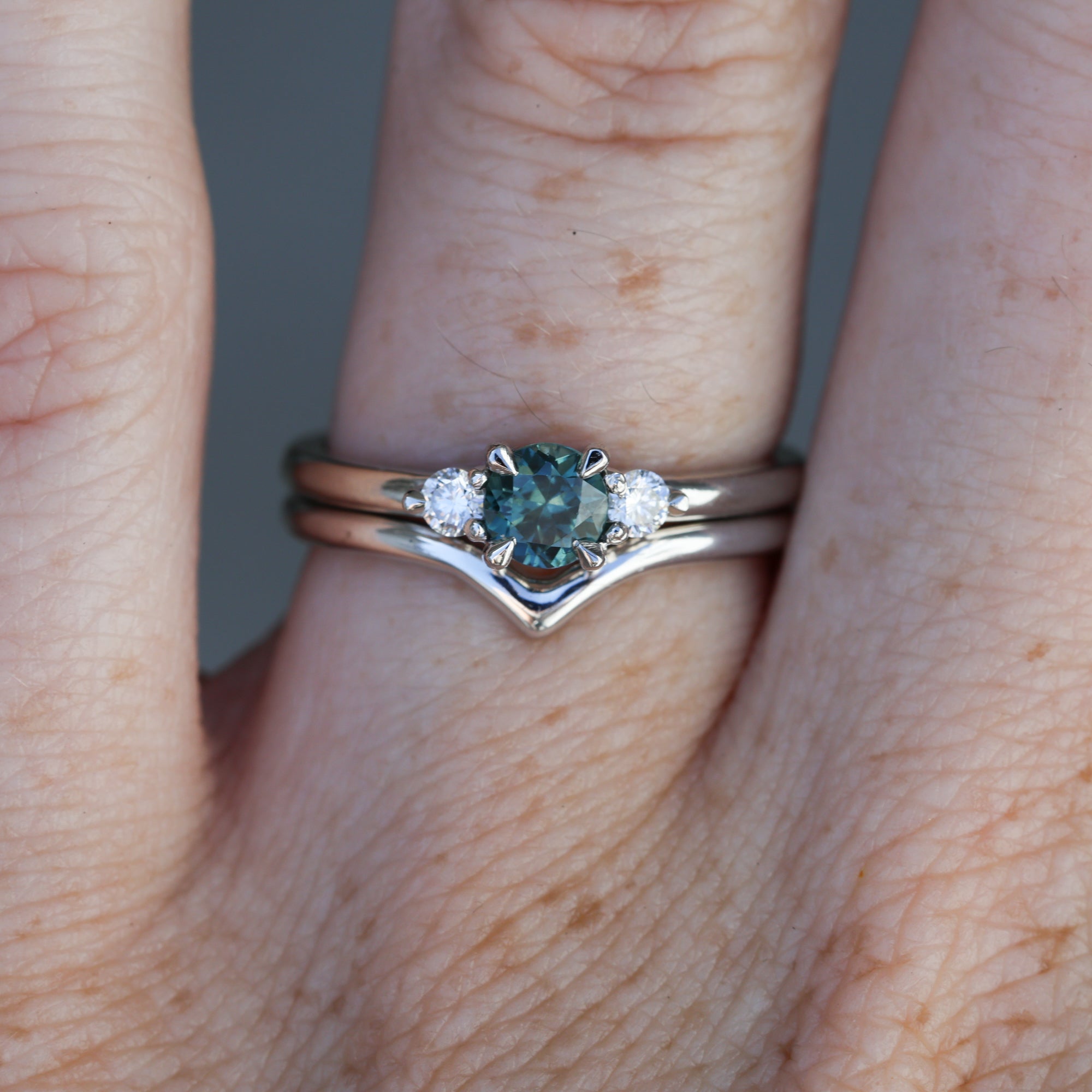 0.46ct round cut australian parti sapphire trilogy engagement ring with wedding band