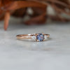 0.47ct Montana Sapphire trilogy engagement ring side view rose gold band