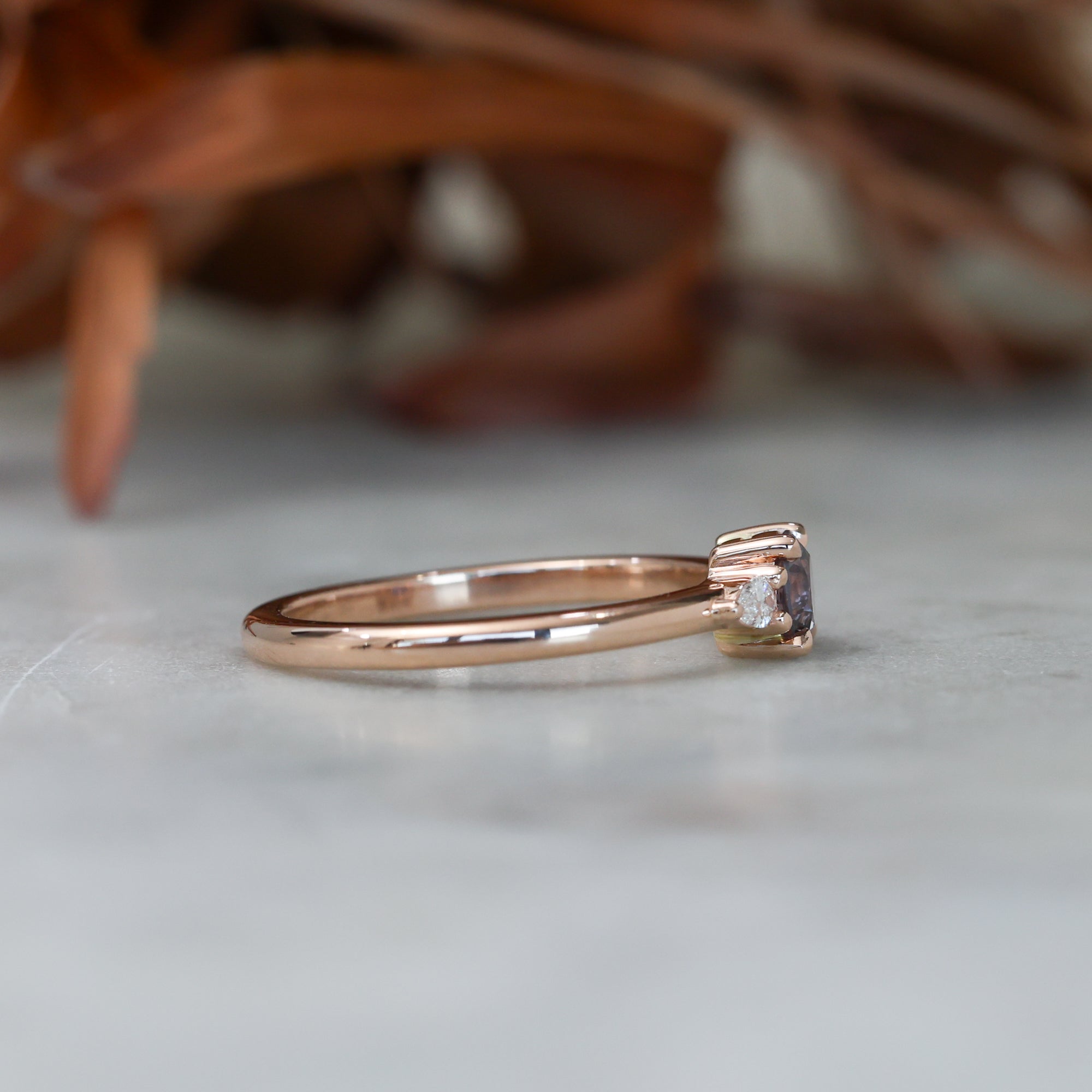 0.47ct Montana Sapphire trilogy engagement ring side view