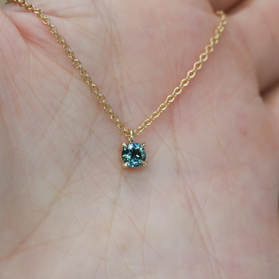 0.48CT ROUND PARTI SAPPHIRE / NECKLACE