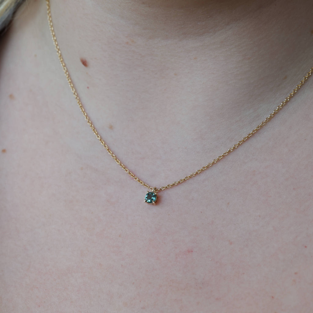 0.48ct round Australian Parti Sapphire necklace on neck