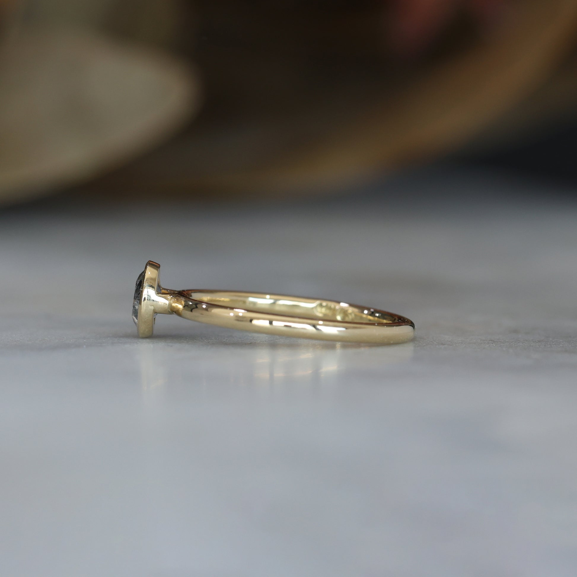 Salt & pepper diamond bezel engagement ring side view