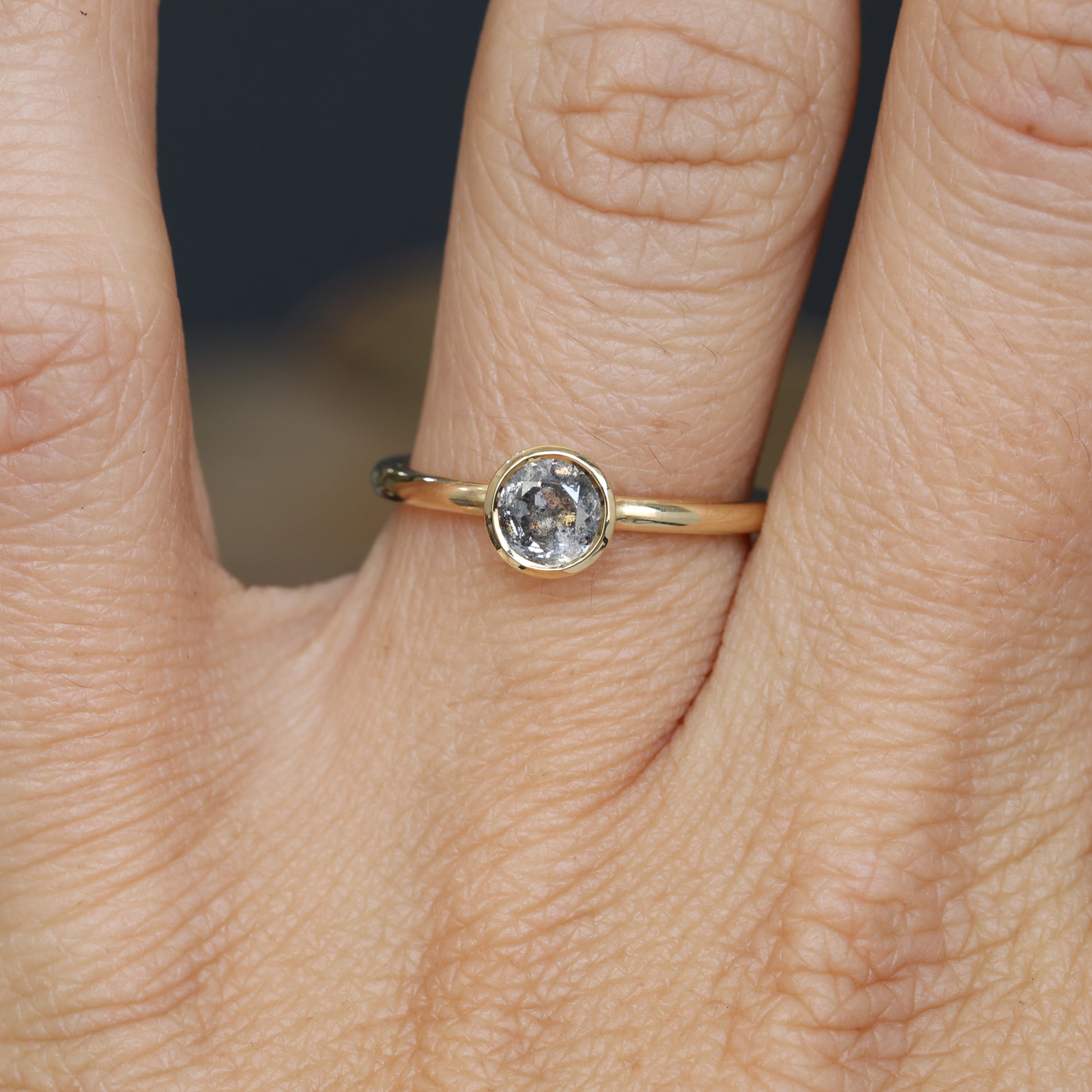 0.50ct Salt and pepper diamond bezel engagement ring on hand