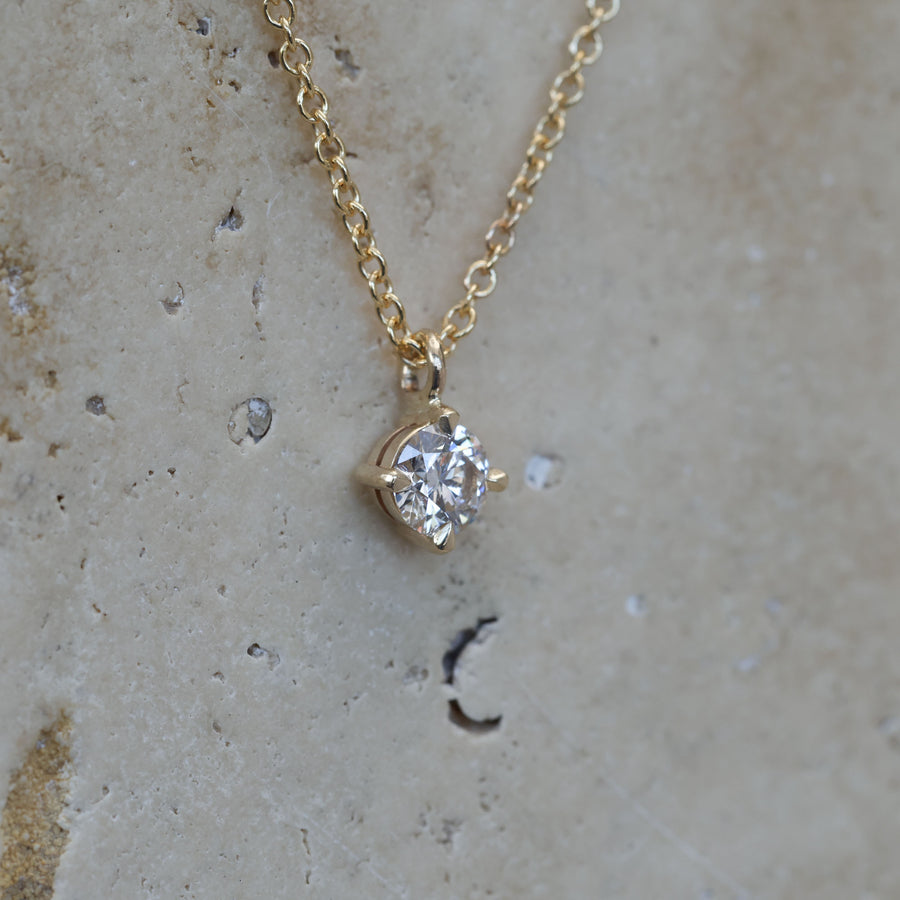 0.50ct round cut diamond necklace yellow gold