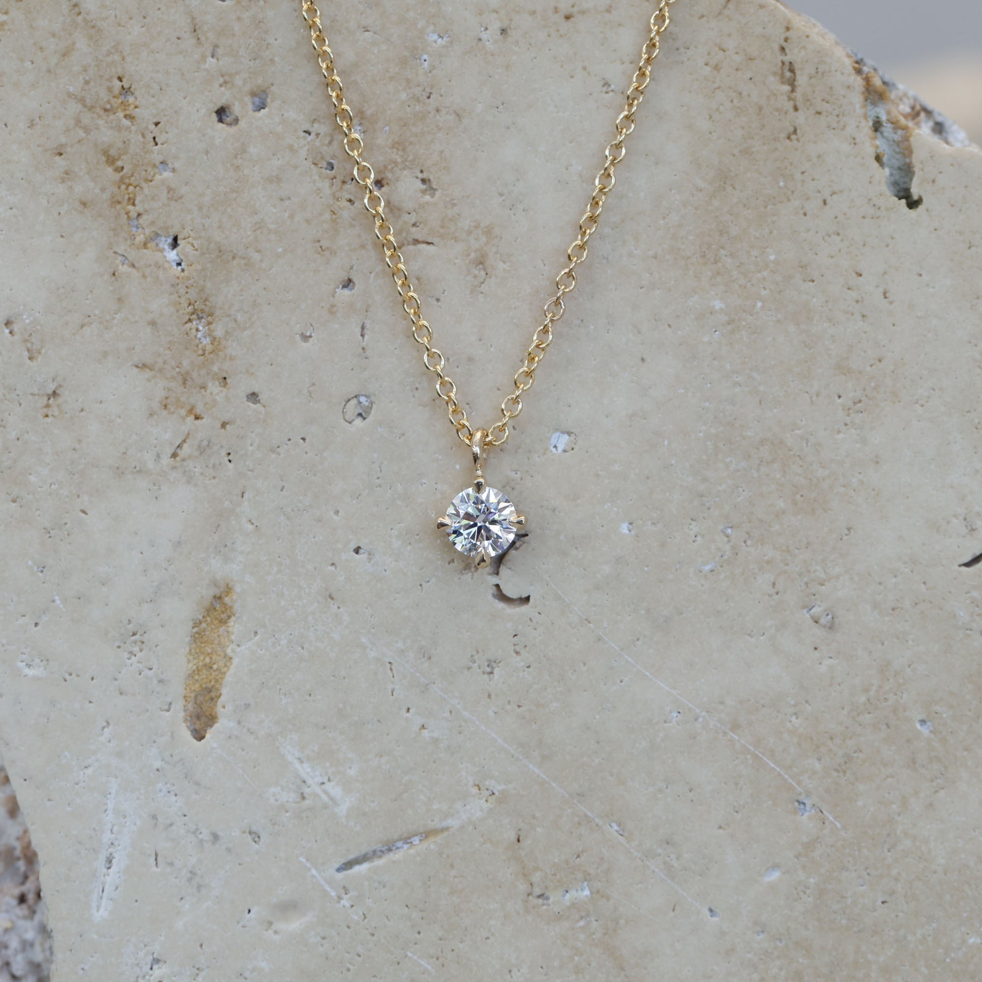 0.50ct round cut diamond necklace yellow gold