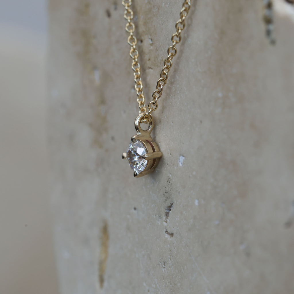 0.50ct round cut diamond necklace yellow gold