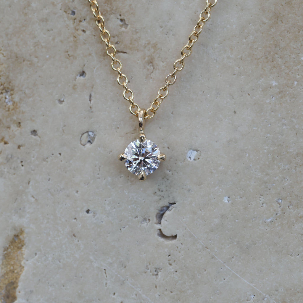 0.50ct round cut diamond necklace yellow gold