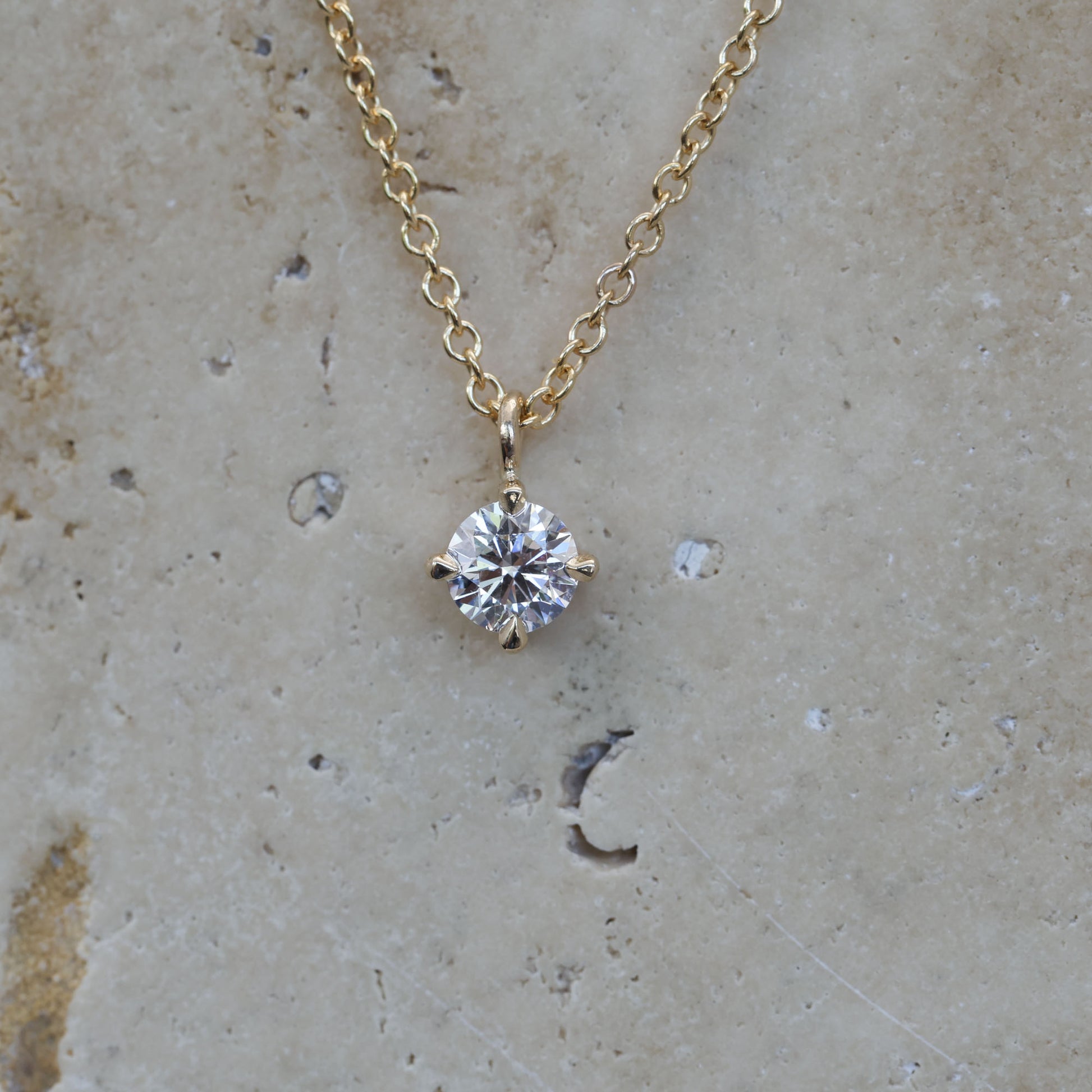 0.50ct round cut diamond necklace yellow gold