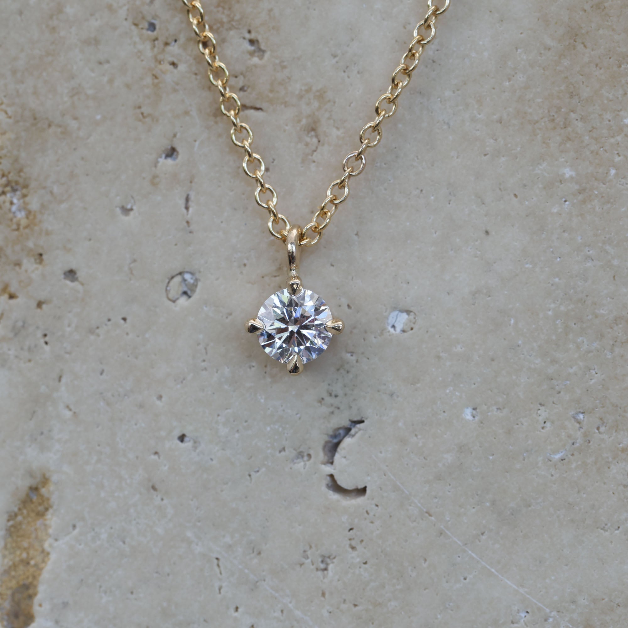 0.50ct round cut diamond necklace yellow gold