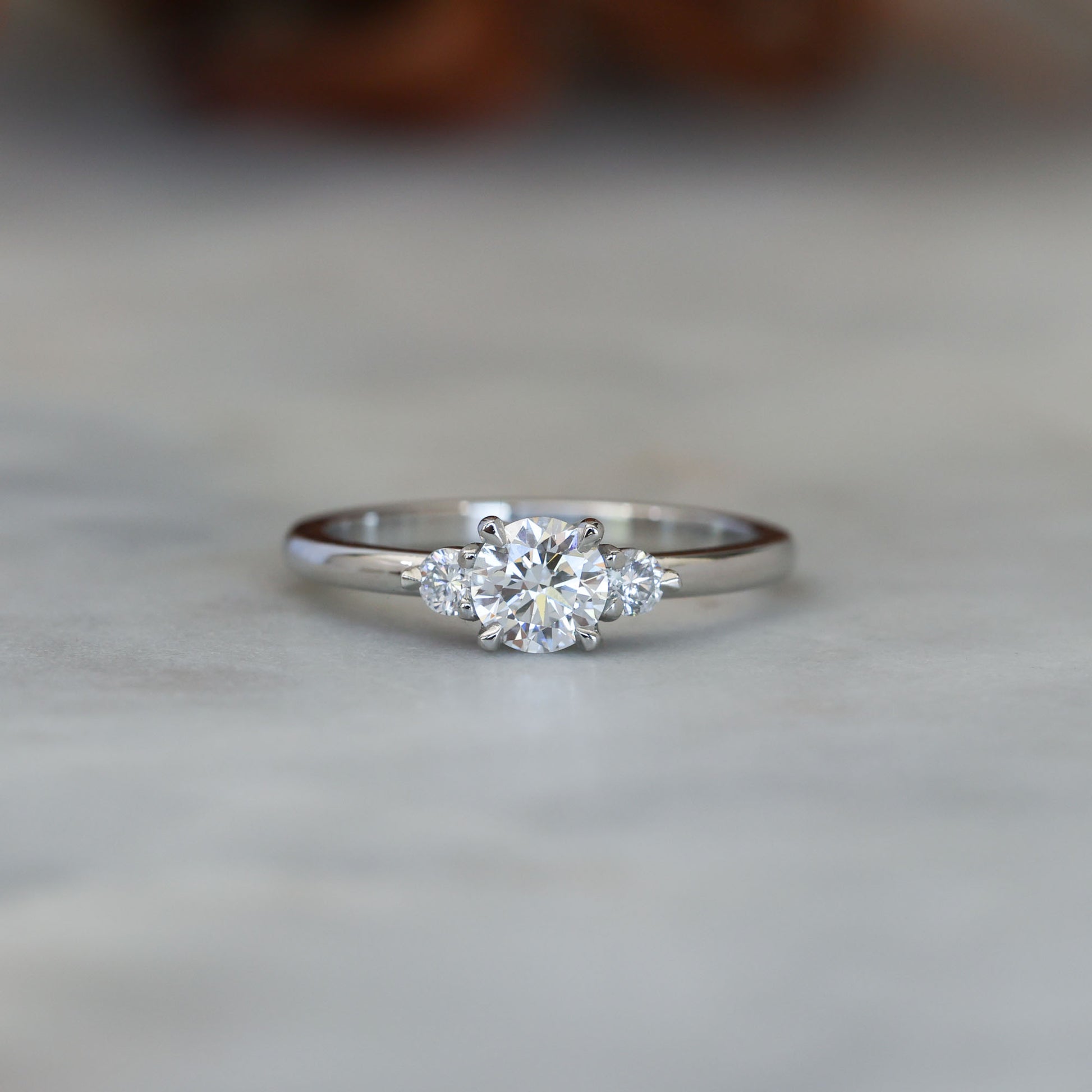 0.50ct round cut lunar trilogy engagement ring in platinum