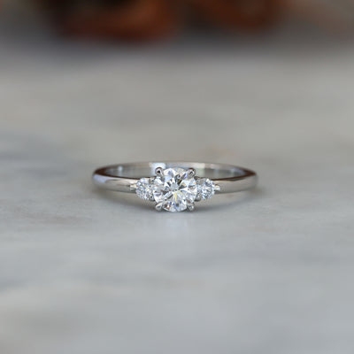 0.50ct round cut lunar trilogy engagement ring in platinum