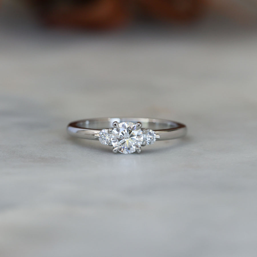 0.50ct round cut lunar trilogy engagement ring in platinum