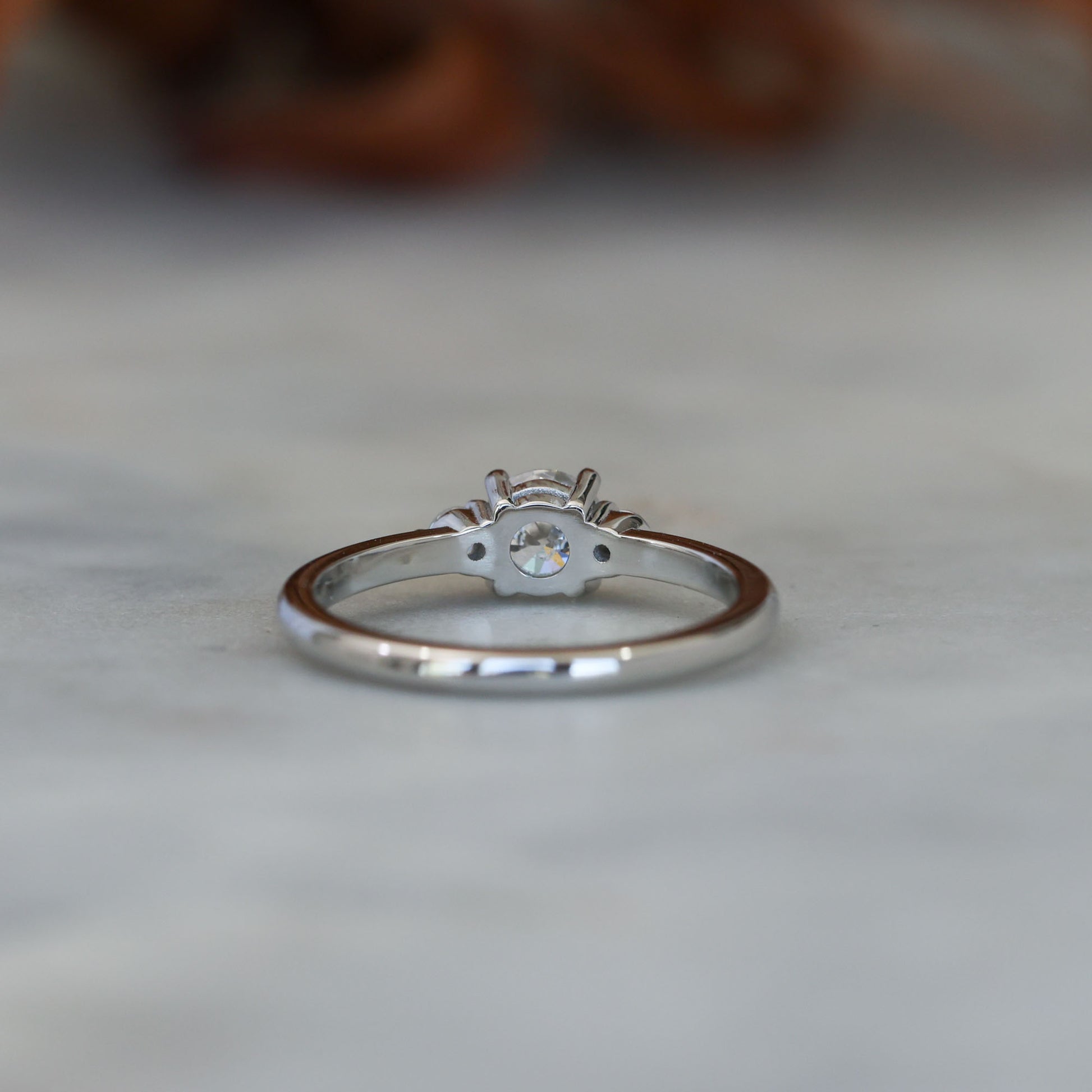 0.50ct round cut lunar trilogy engagement ring in platinum