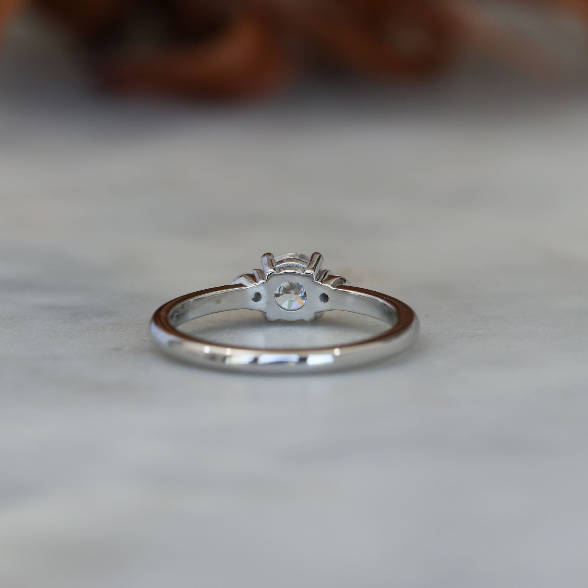 0.50ct round cut lunar trilogy engagement ring in platinum