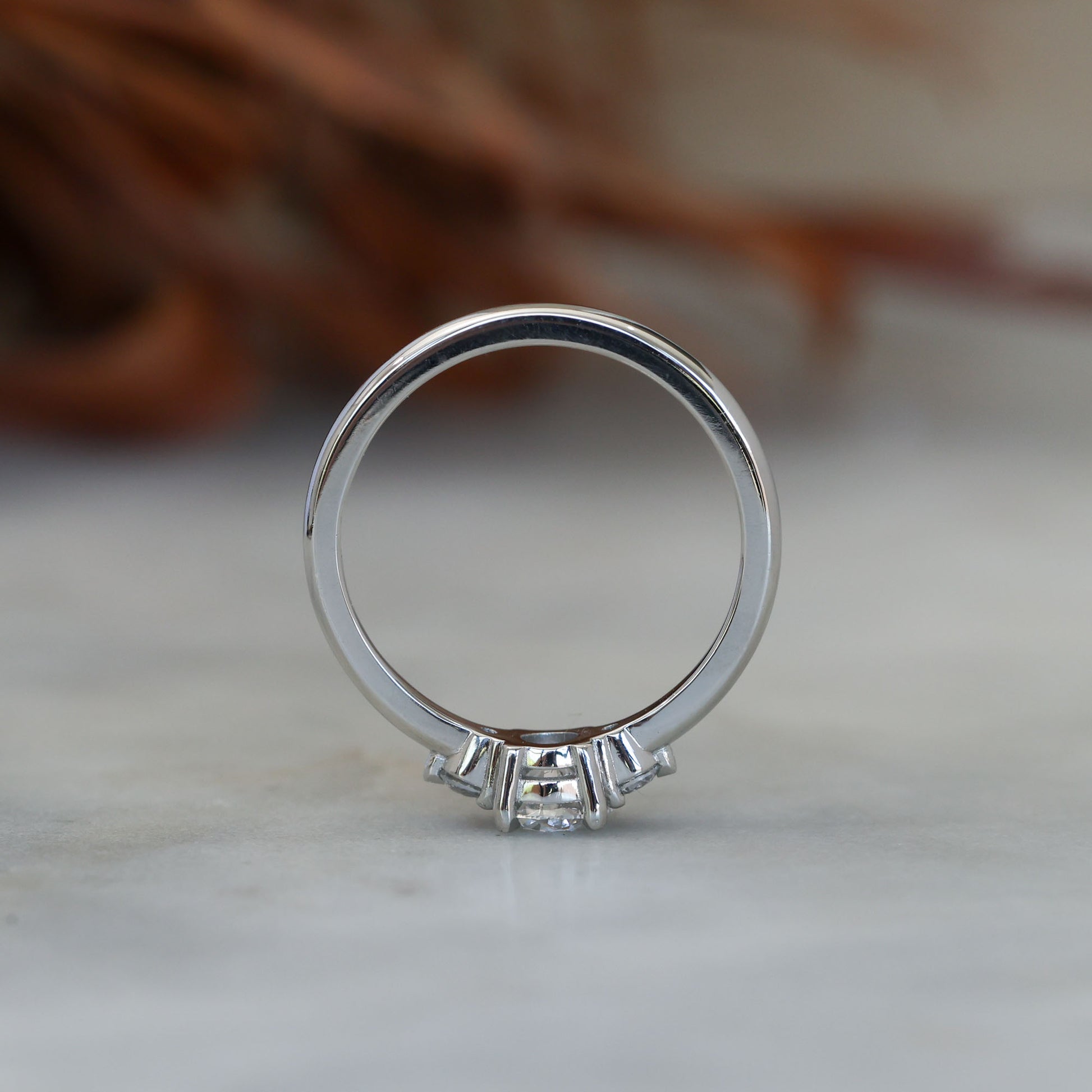0.50ct round cut lunar trilogy engagement ring in platinum