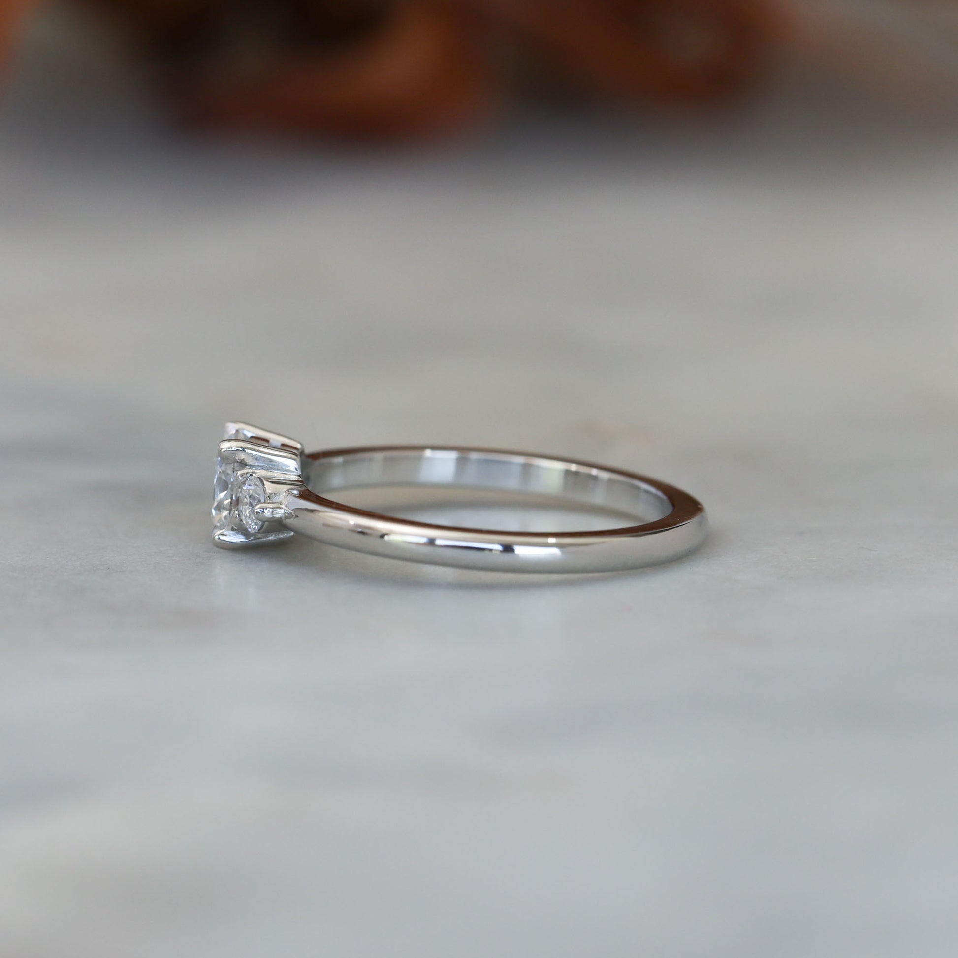 0.50ct round cut lunar trilogy engagement ring in platinum