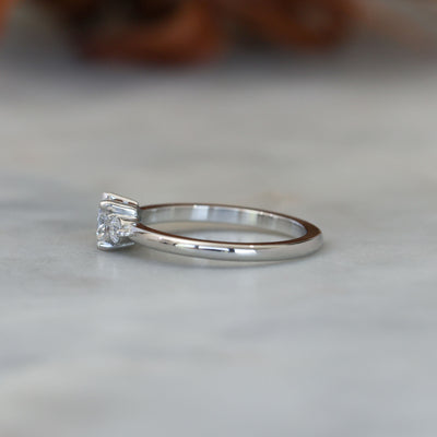 0.50ct round cut lunar trilogy engagement ring in platinum