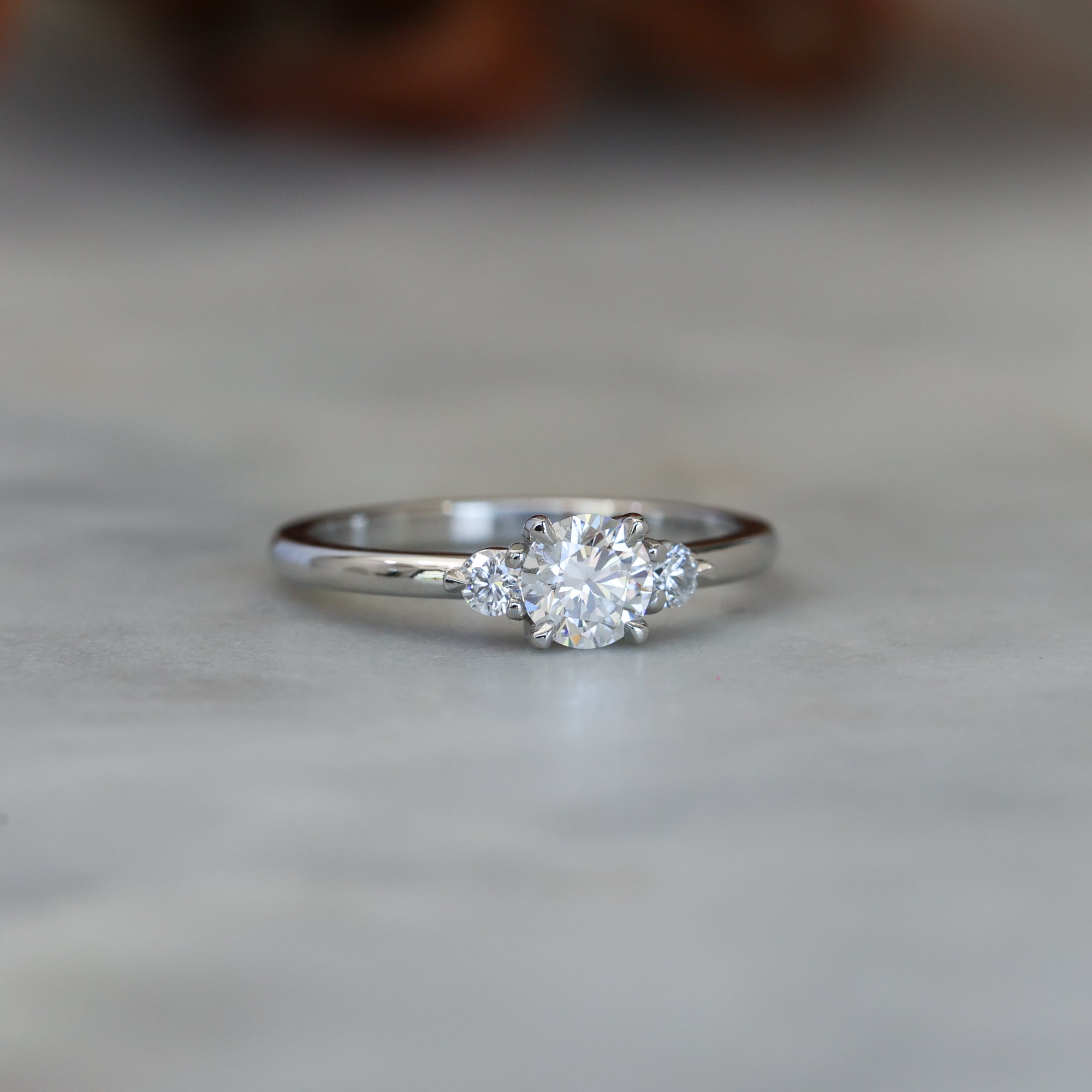 0.50ct round cut lunar trilogy engagement ring in platinum