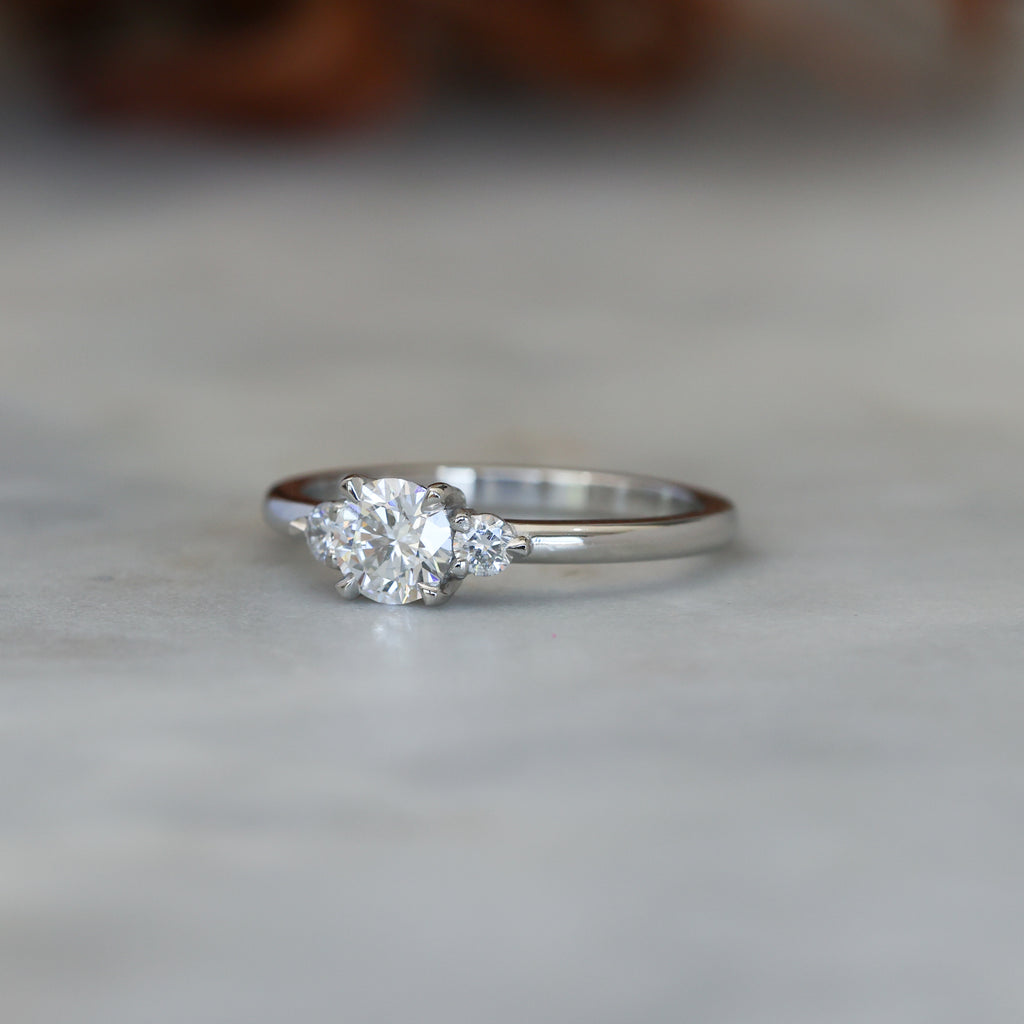0.50ct round cut lunar trilogy engagement ring in platinum