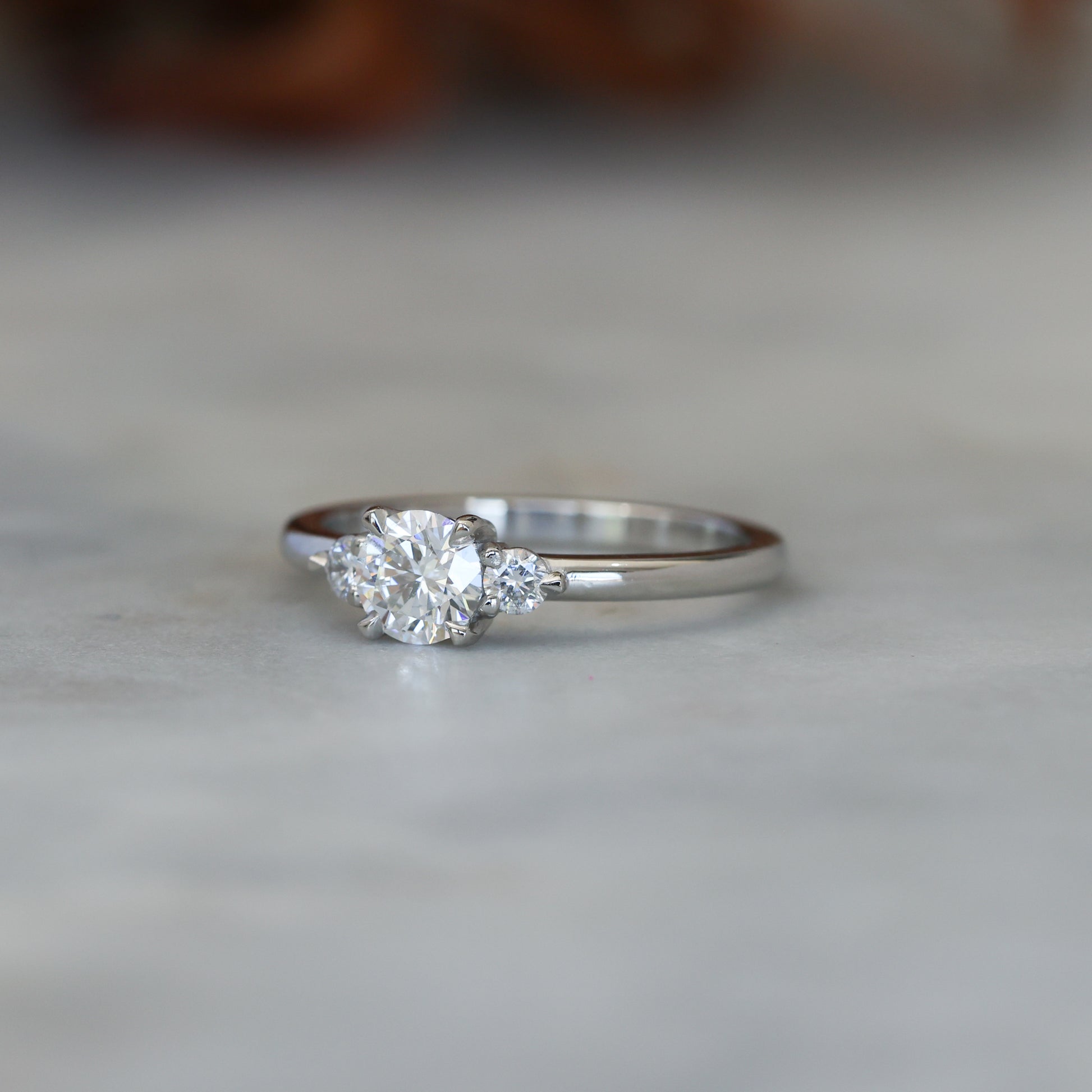 0.50ct round cut lunar trilogy engagement ring in platinum