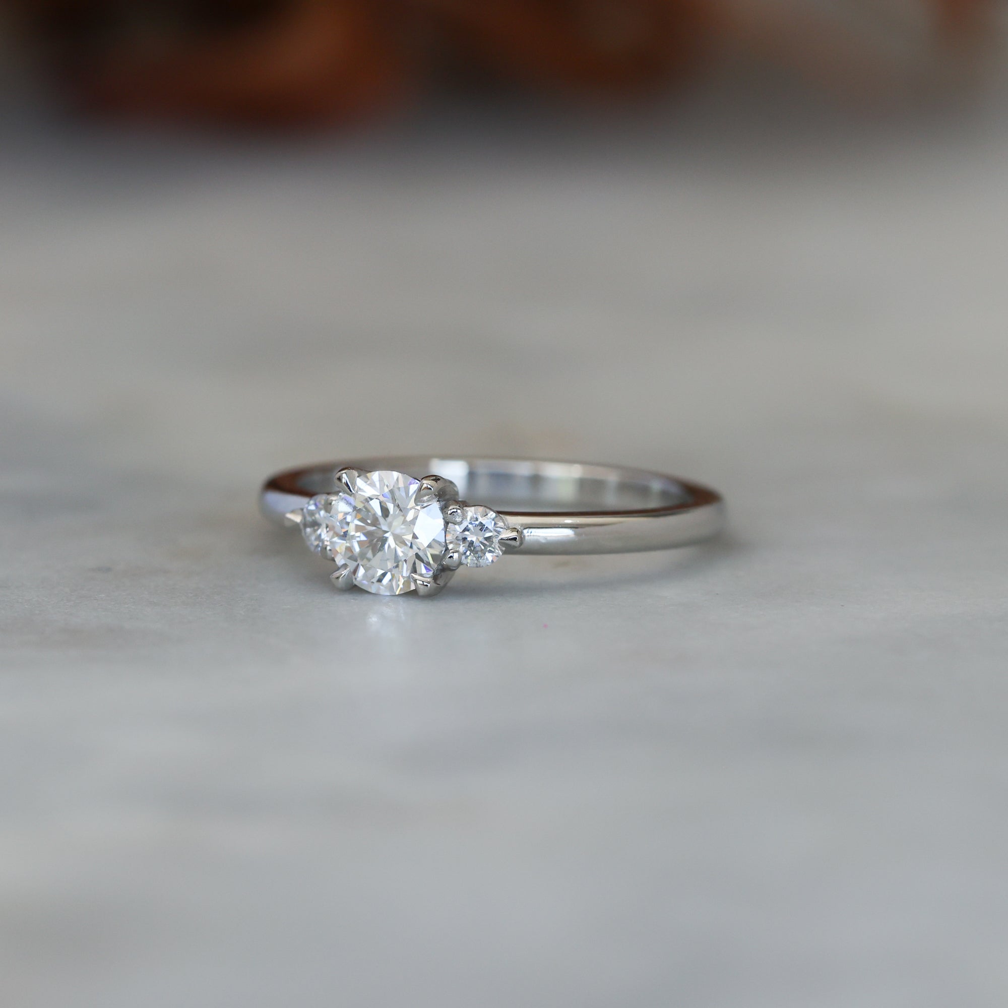 0.50ct round cut lunar trilogy engagement ring in platinum