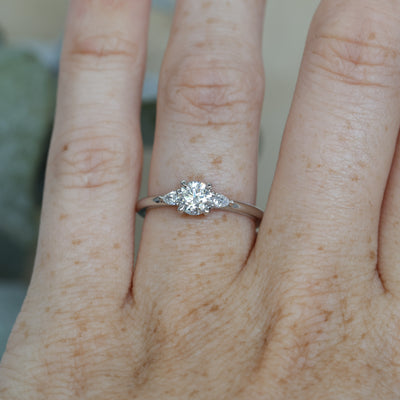 0.52ct Diamond and platinum engagement ring on hand