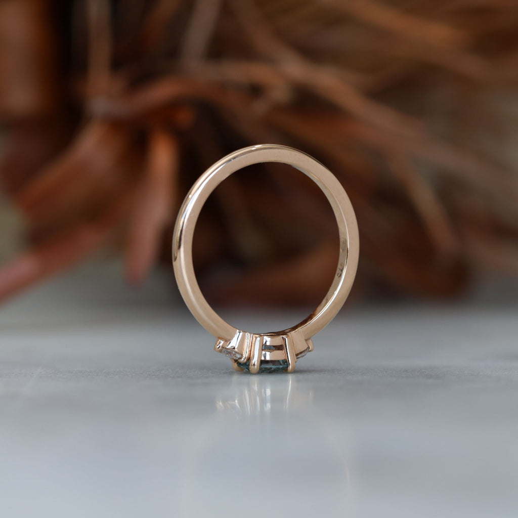 0.58ct Montana Sapphire trilogy engagement ring profile view