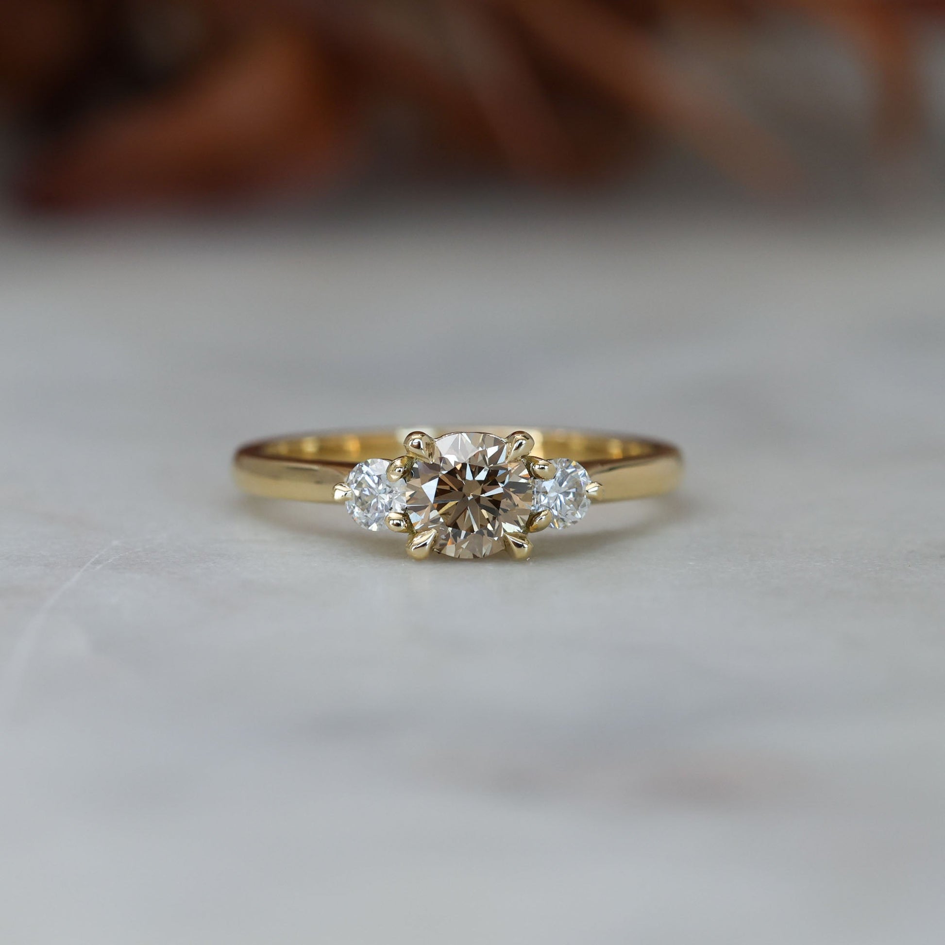 0.62ct Champagne diamond trilogy engagement ring