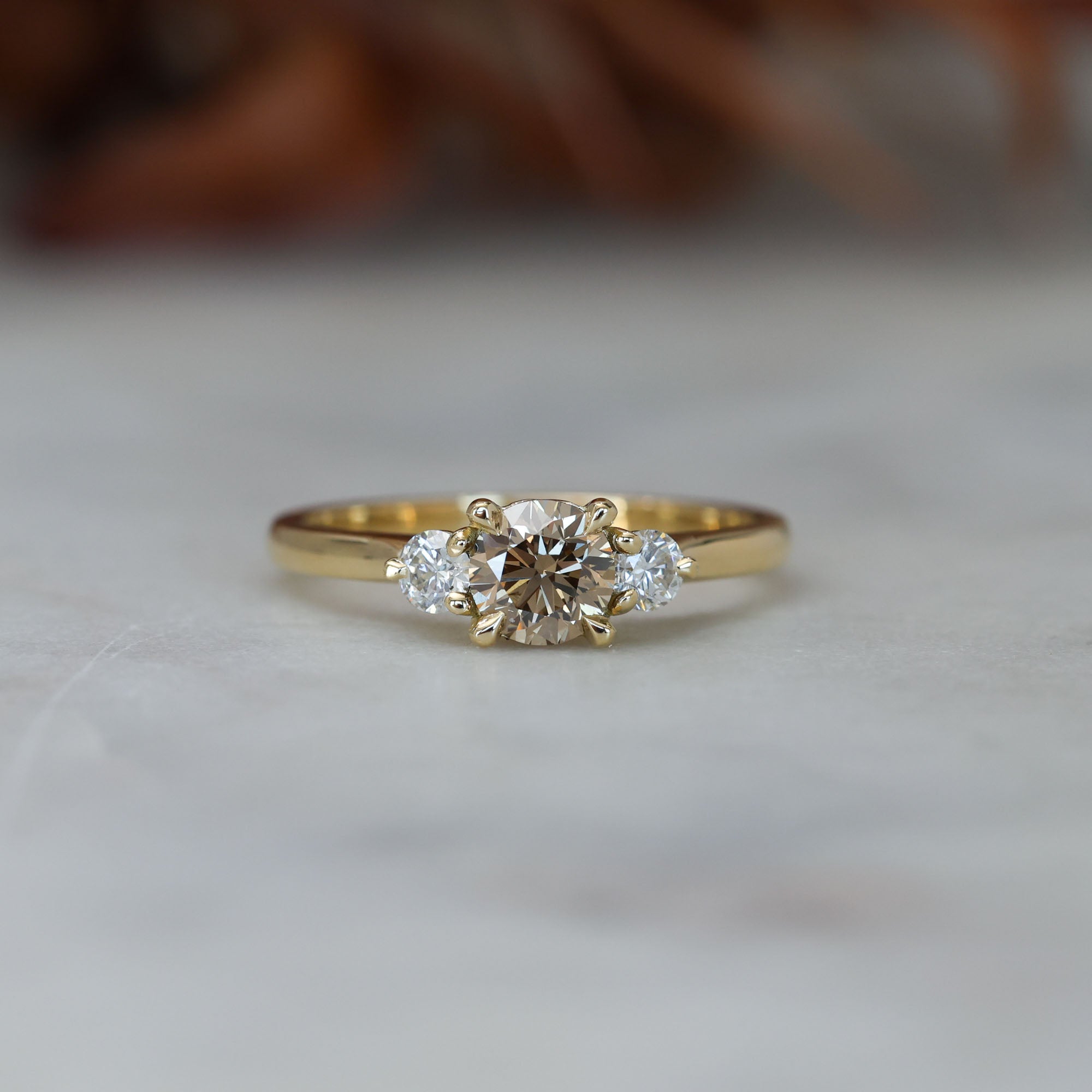 0.62ct Champagne diamond trilogy engagement ring