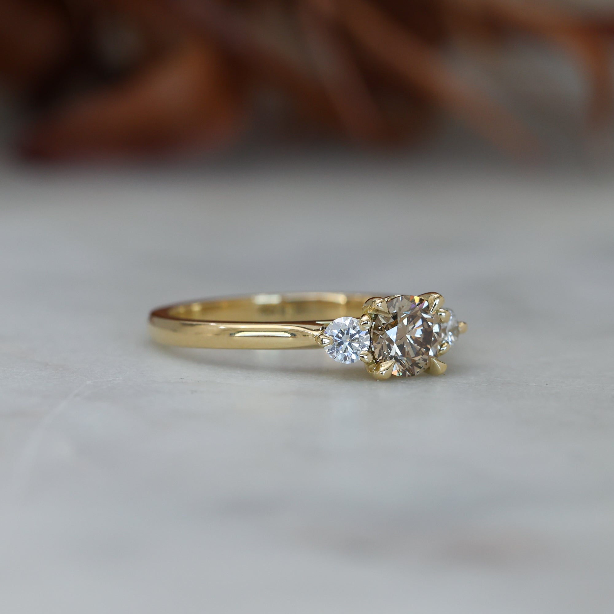 0.62ct Champagne diamond trilogy engagement ring side