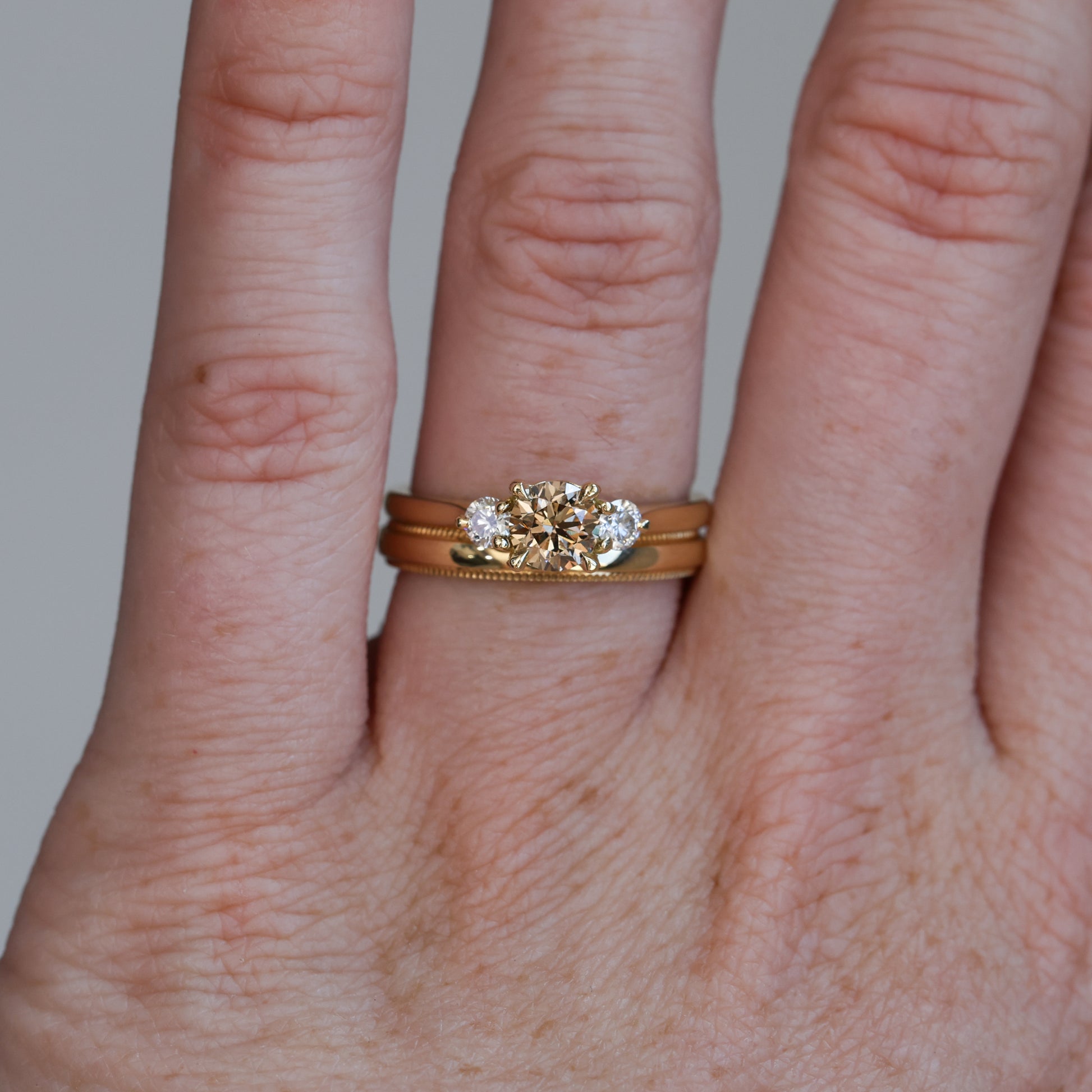 0.62ct Champagne diamond trilogy engagement ring with wedding band