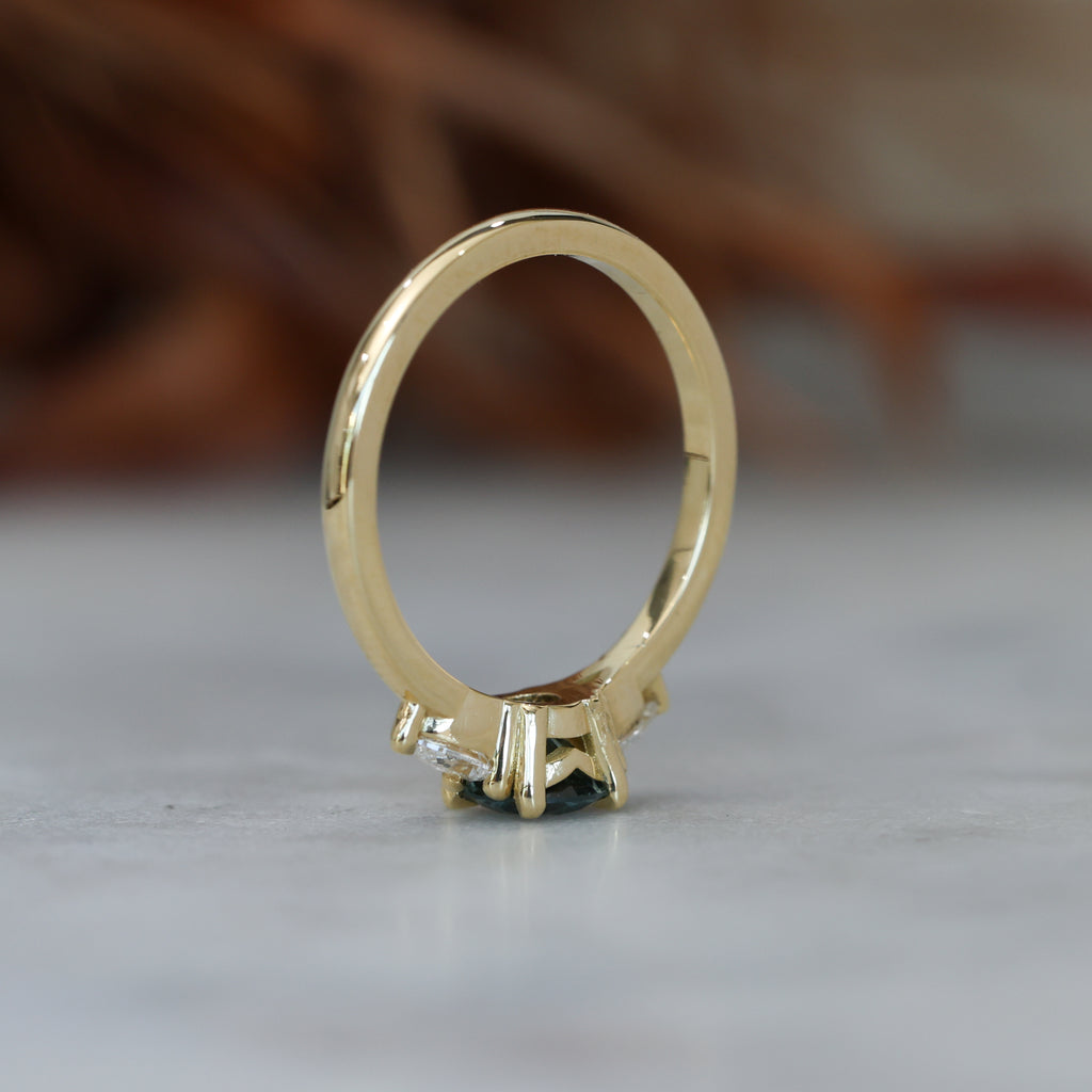 0.67ct Montana Sapphire and diamond May trilogy engagement ring profile