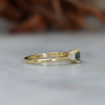 0.67ct Montana Sapphire and diamond May trilogy engagement ring side