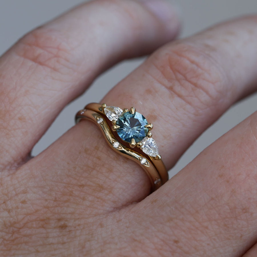 0.67ct Montana Sapphire and diamond May trilogy engagement ring