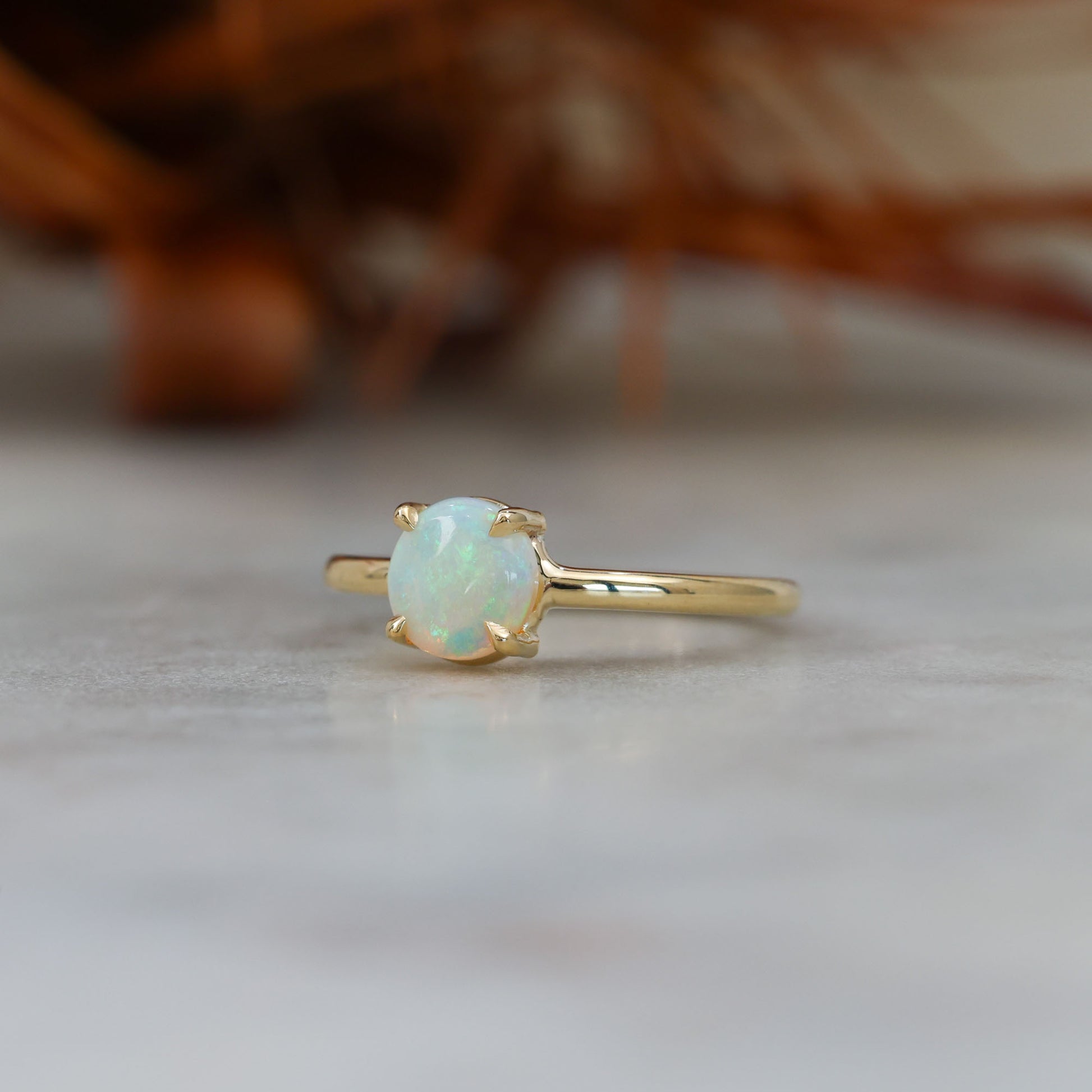 0.71CT ROUND CUT OPAL | RING