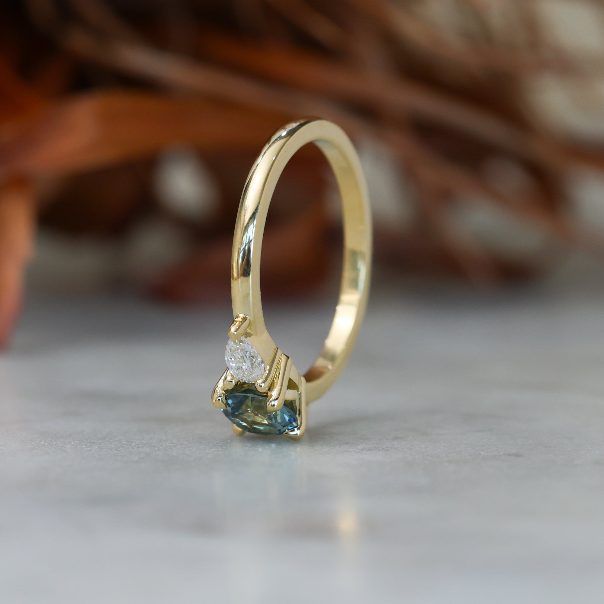 0.72ct Montana Sapphire engagement ring in yellow gold