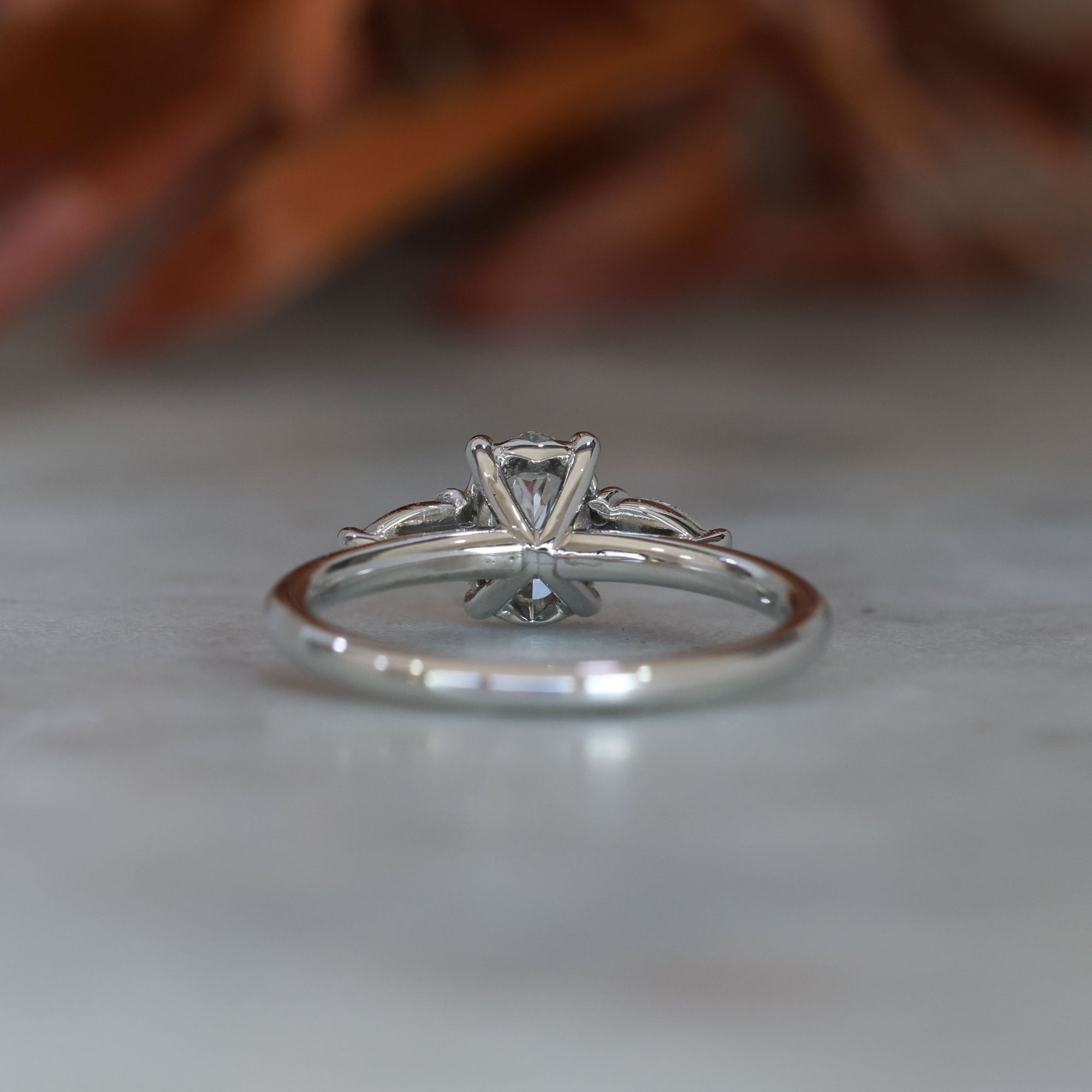 0.72ct Oval Cut Trilogy Platinum engagement ring