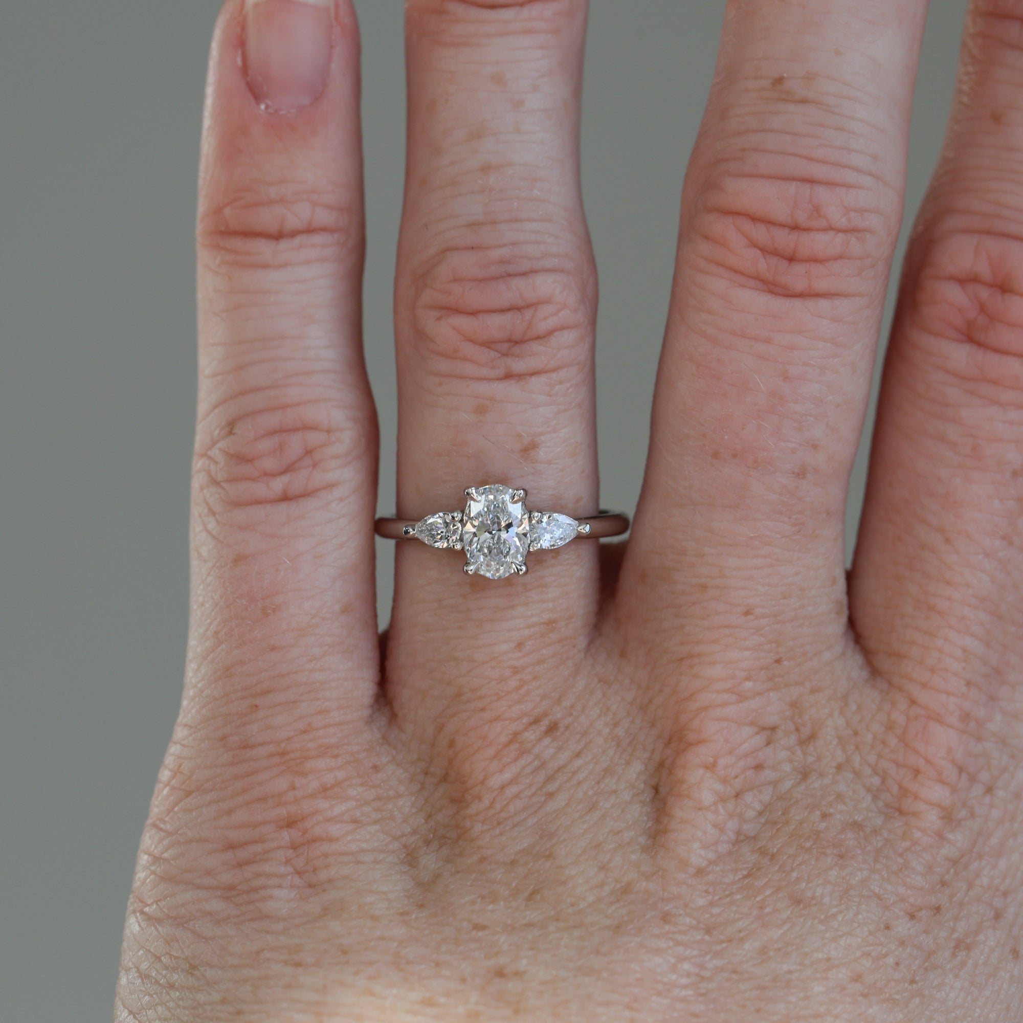 0.72ct Oval Cut Trilogy Platinum engagement ring